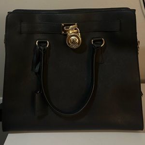 Black Michael Kors Crossbody Tote with gold hardware
